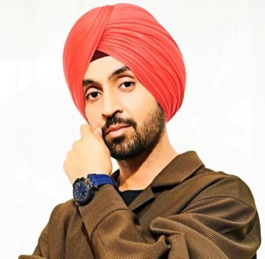 Read more about the article Mystery Woman Debunks Marriage Rumors with Diljit Dosanjh, Clarifies Origin of Viral Photos