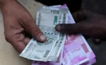 Rupee hits 80 to a dollar as global equity slump hammers currencies