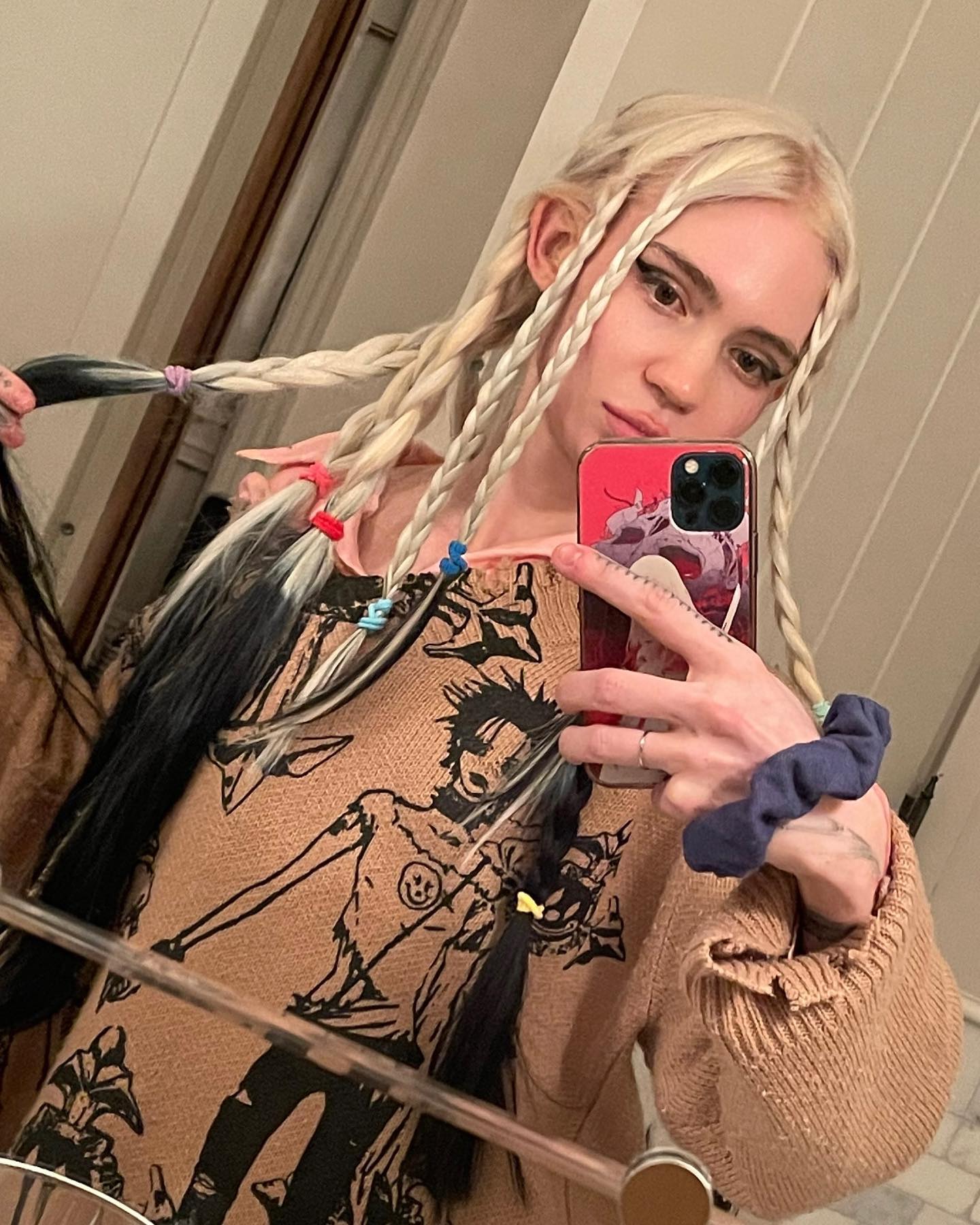 Grimes Vows to Correct Course After Technical Mishaps at Coachella