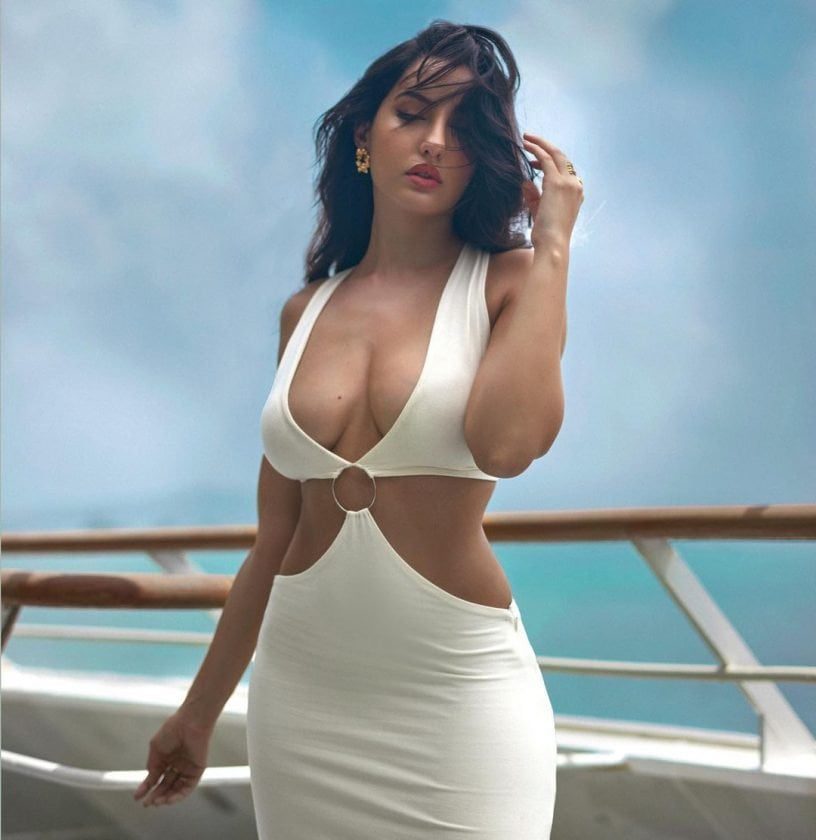 Nora Fatehi Hot Sexy white dee[ Cle**age