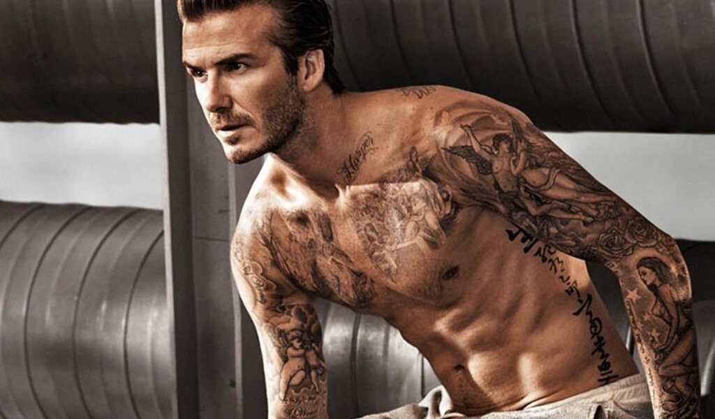 David Beckham unveils Chinese tattoo