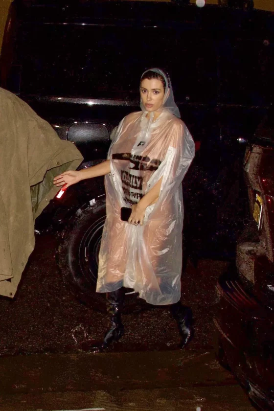 Bianca Censori Naked in Raincoat 