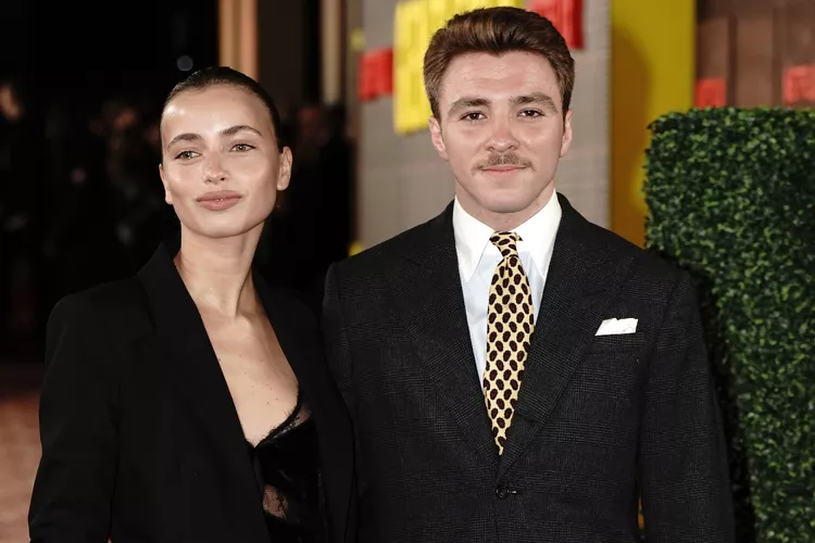 Rocco Ritchie and Olivia Monjardin Dazzle in Coordinated Elegance at 'The Gentlemen' London Premiere