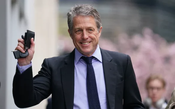 Read more about the article Hugh Grant Settles Lawsuit Against The Sun Publisher Over Alleged Phone Tapping and Burglary