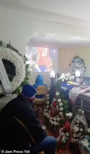 Mourners Watch Copa America Match Beside Relative's Coffin at Chilean Wake