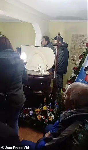 Mourners Watch Copa America Match Beside Relative's Coffin at Chilean Wake