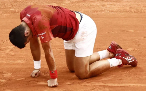 Read more about the article Novak Djokovic Battles Through Knee Injury to Secure Record 370th Grand Slam Win
